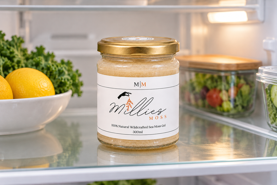 A closed Millie’s Moss Golden Gel jar on a glass refrigerator shelf.