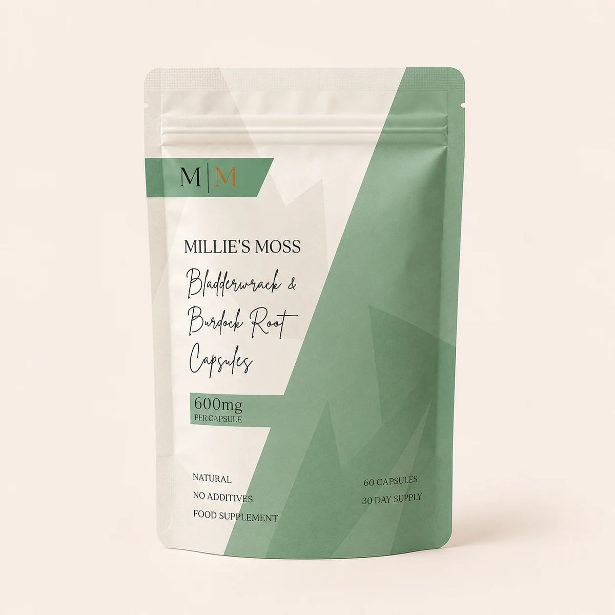 Front pack shot of Millie’s Moss Bladderwrack & Burdock Root Capsules pouch on a soft off-white background.