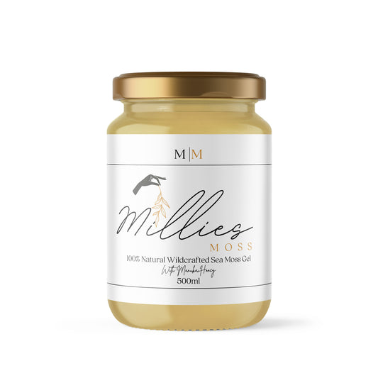 A 500ml jar of Millies Moss sea moss gel infused with Manuka honey, with a white label on the front. Front view