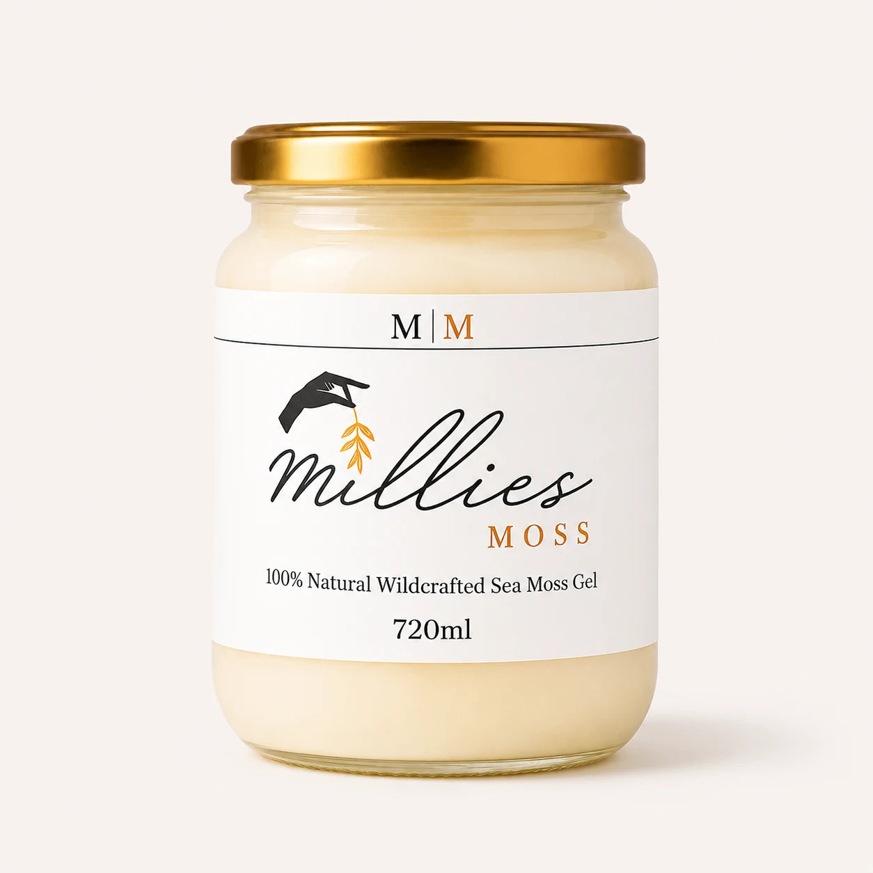Jar of Millie's Moss Golden Sea Moss Gel 720ml with a gold lid on a white background
