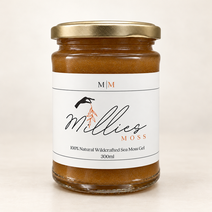 Millie’s Moss Medjool Dates Infused Sea Moss Gel 300ml glass jar with a gold lid on a warm off-white background.