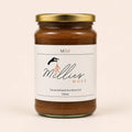 Millie’s Moss Cacao Infused Sea Moss Gel 720ml jar on a warm off-white background.