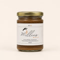 Millie’s Moss Cocoa, Matcha, Cinnamon & Manuka Honey Infused Sea Moss Gel 300ml jar on a warm off-white background.