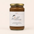 Millie’s Moss Cocoa, Matcha, Cinnamon & Manuka Honey Infused Sea Moss Gel 720ml jar on a warm off-white background.
