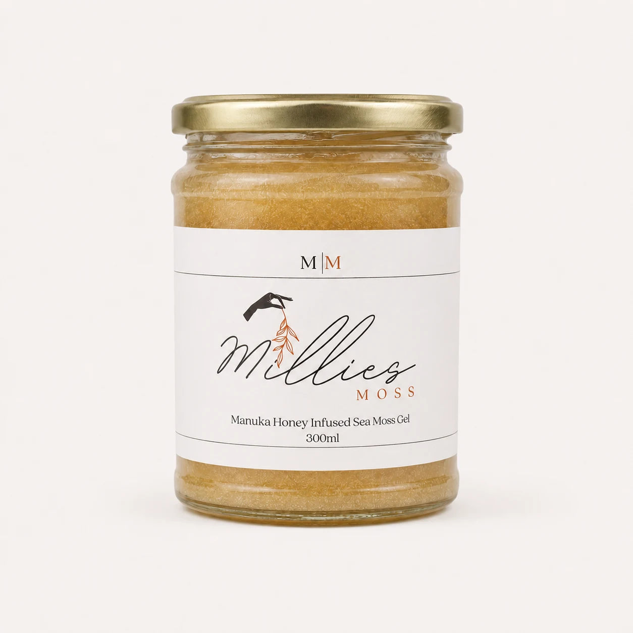 Millie’s Moss Manuka Honey Infused Sea Moss Gel 300ml jar on a warm off-white background.