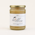 Millie’s Moss Manuka Honey Infused Sea Moss Gel 500ml jar on a warm off-white background.