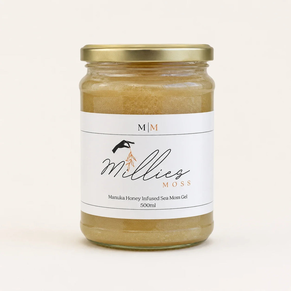 Millie’s Moss Manuka Honey Infused Sea Moss Gel 500ml jar on a warm off-white background. Temporary reference image for this flavour.
