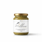 Millie’s Moss 300ml sea moss gel jar with bladderwrack and burdock root on a white background.