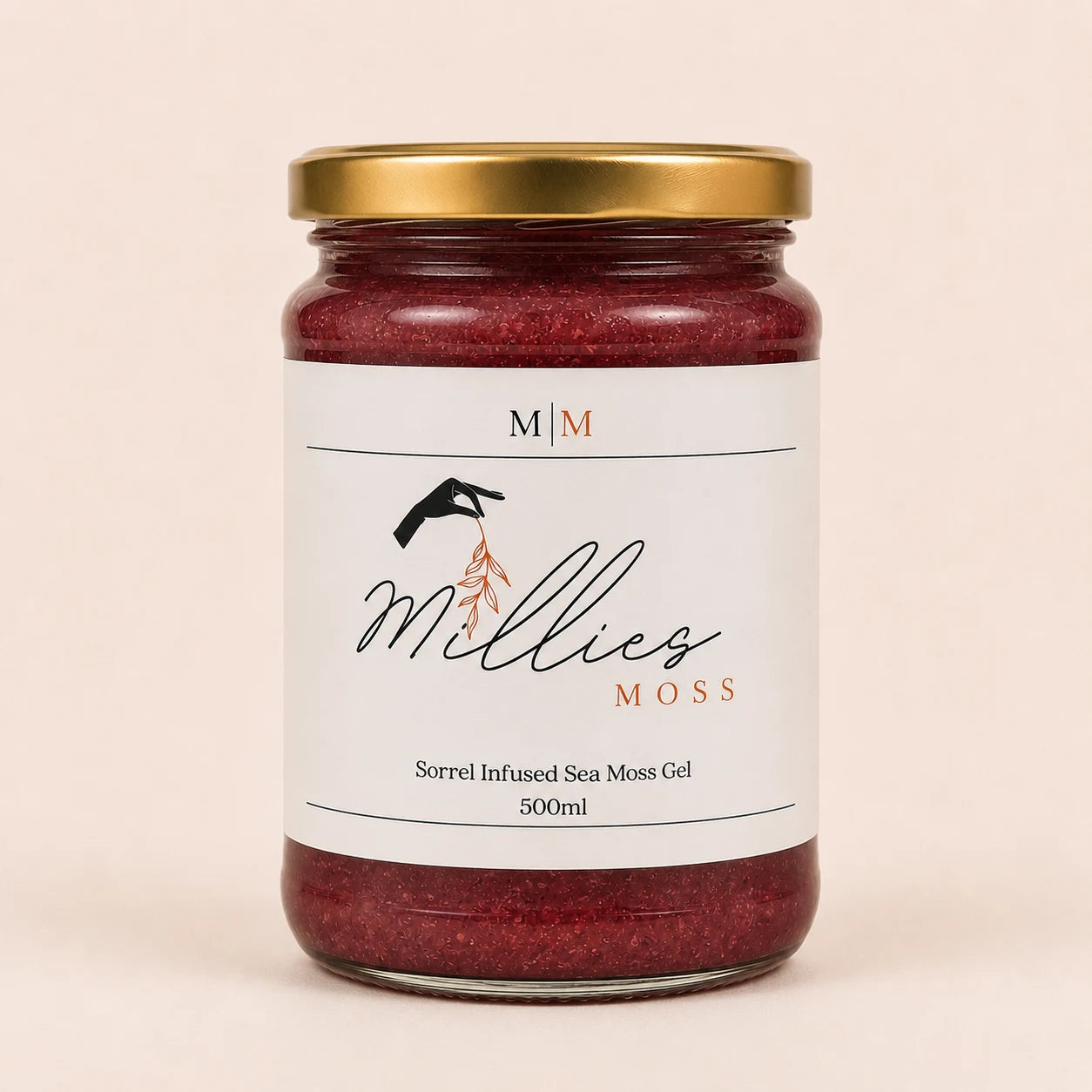 Millie’s Moss Sorrel Infused Sea Moss Gel 500ml jar on a warm off-white background.