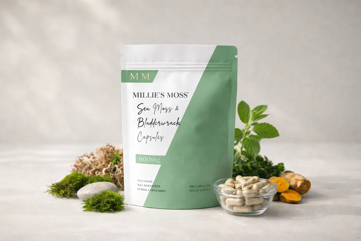 Millie’s Moss sea moss and bladderwrack capsules displayed with natural herbal ingredients.