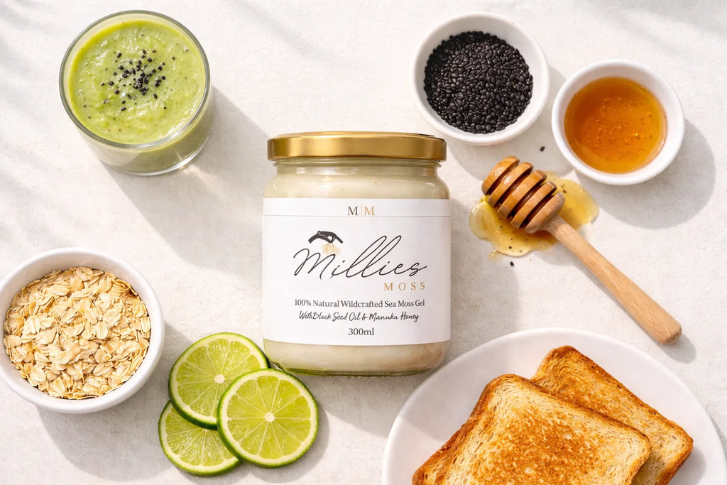 Millie’s Moss sea moss gel jar with a smoothie, oats, lime, honey, chia seeds and toast on a light surface.