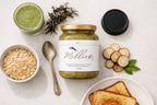 Sea moss gel jar with oats, toast and herbal ingredients for a nutritious breakfast