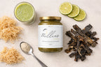 Sea moss gel jar surrounded by raw sea moss lime slices and blended sea moss smoothie ingredients