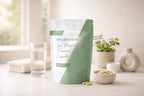Millie’s Moss sea moss and turmeric capsules displayed with a glass of water in a clean wellness setting.